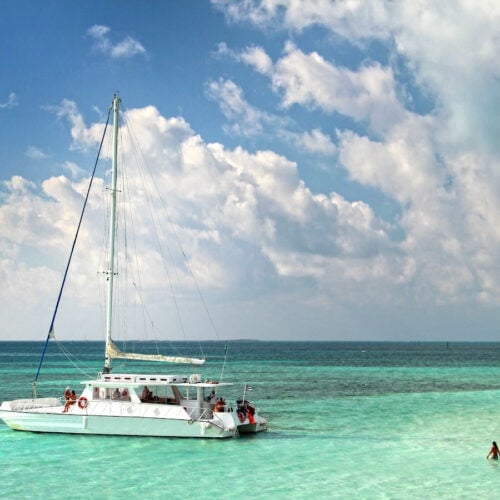 A couple on a romantic catamaran tour.