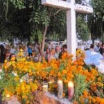 Marigolds and candles at a cemetery on Day of the Dead in Puerto Escondido, Mexico.