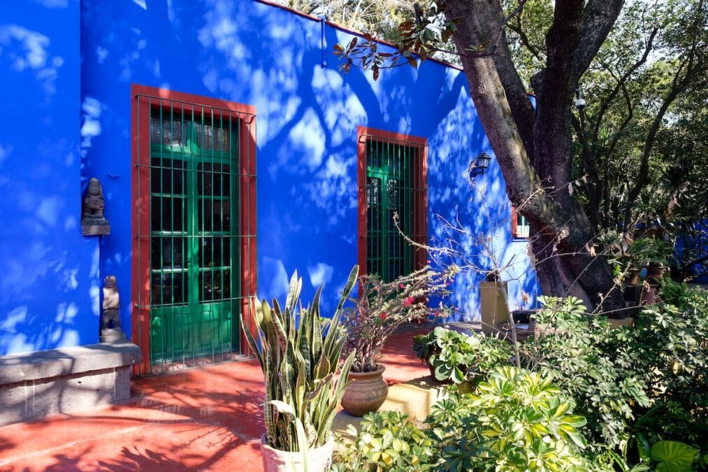Colorful courtyard at the Frida Kahlo Museum in Mexico City.