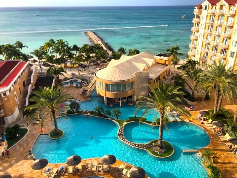 View of swimming pool at Divi Aruba Phoenix Beach Resort in the Dutch Caribbean. 