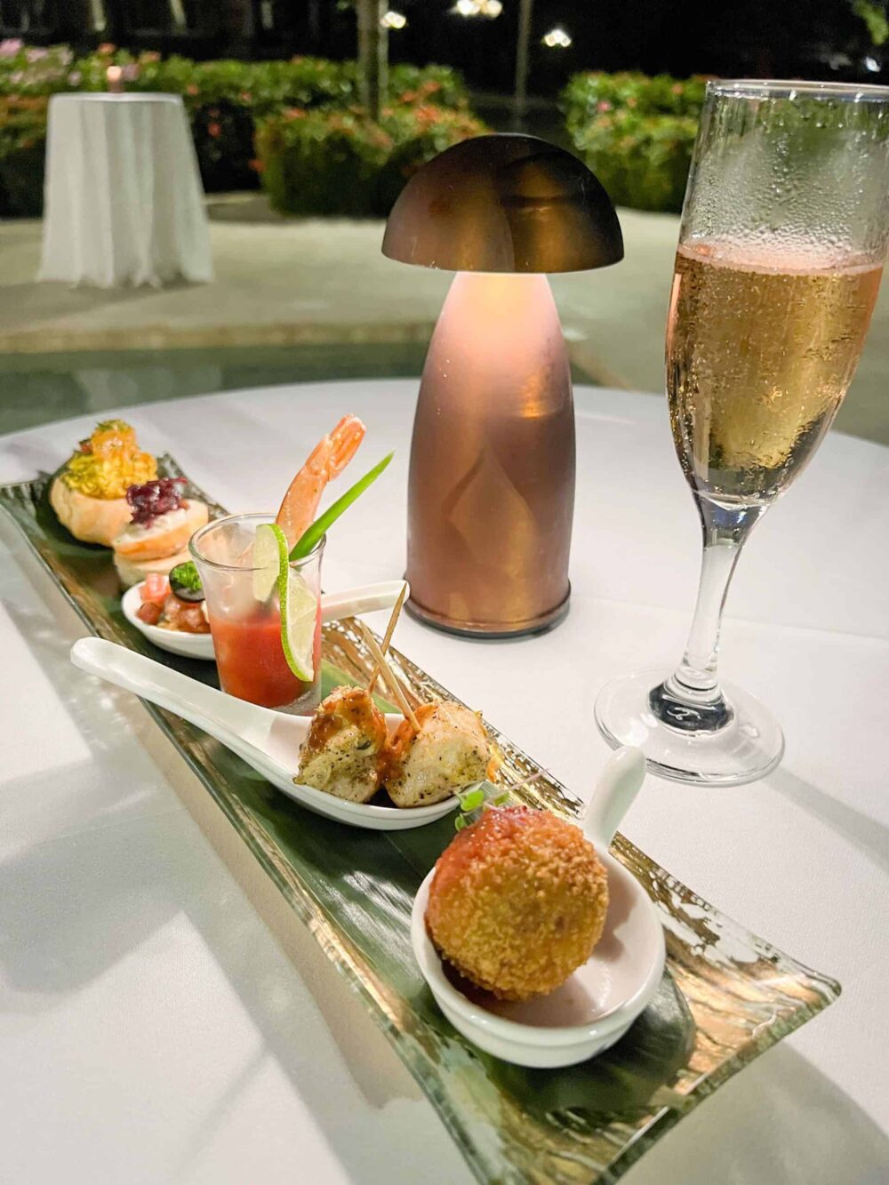 Fancy appetizers and champagne at Sandals Grande Antigua.
