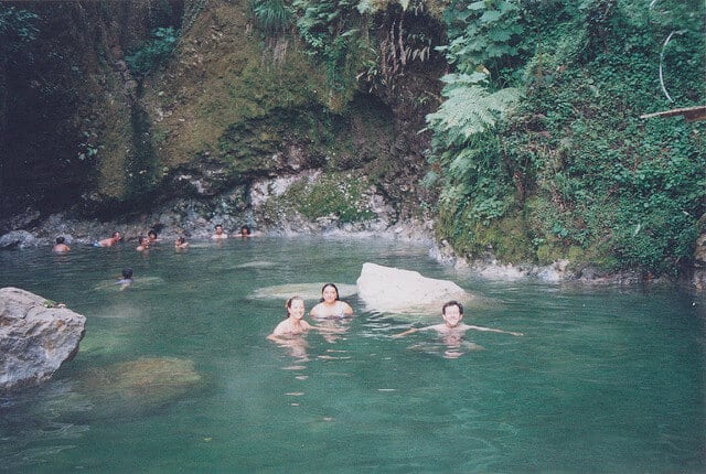 People swimming at Fuentes Georgina copyright Ken Mayer made available on Flickr by Attribution 2.0 Generic (CC by 2.0) License