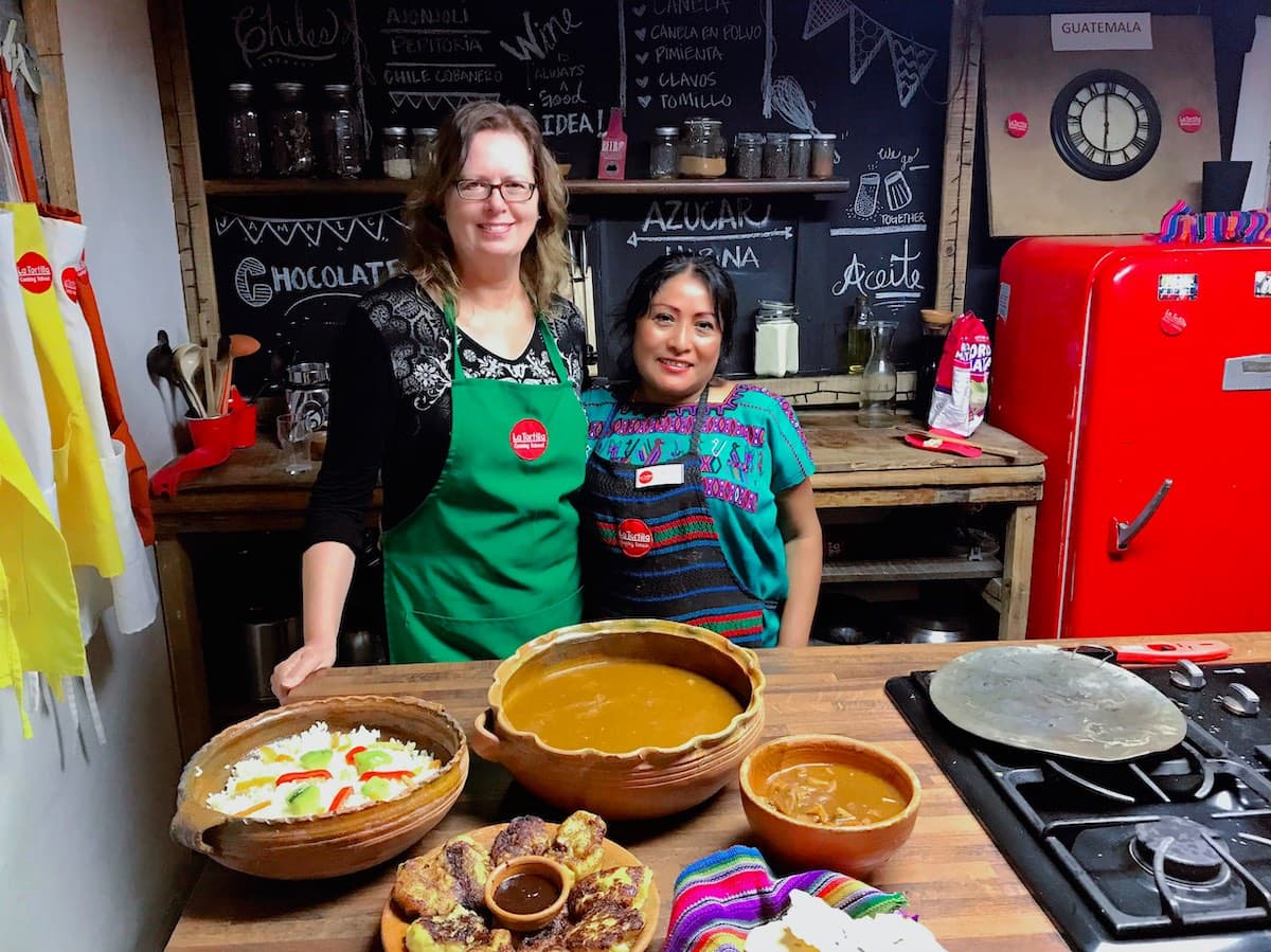 Student and instructor at La Tortilla Cooking School in Antigua Guatemala.