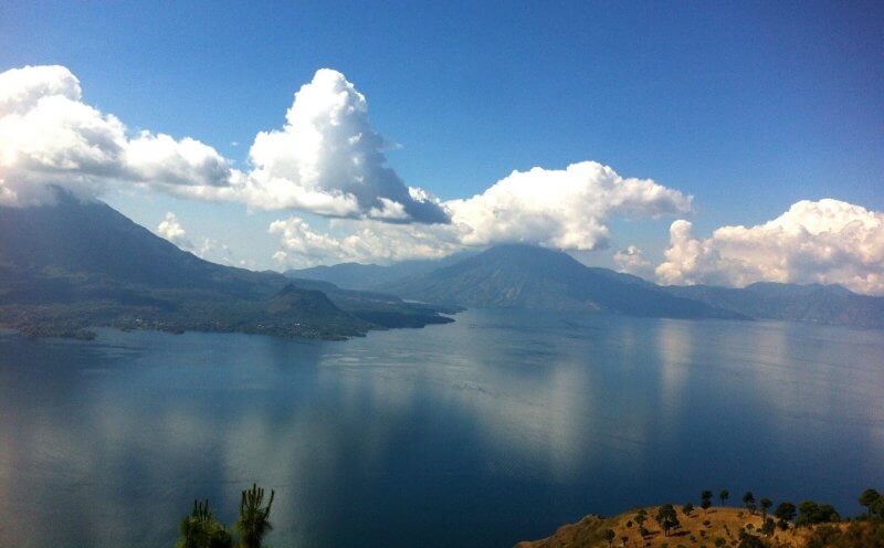 View of Lake Atitlan, clouds and mountains in Panajachel, Guatemala.