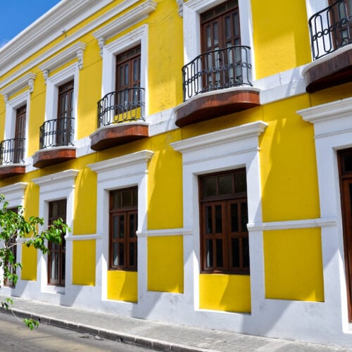 A yellow colonial building in Old San Juan, Puerto Rico.