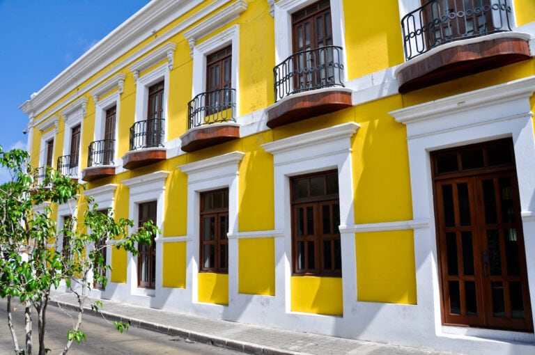 A yellow colonial building in Old San Juan, Puerto Rico.