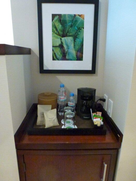 In-room coffee maker and water at Courtyard Mexico City Airport Hotel