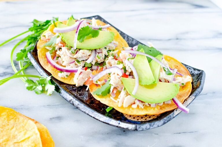 Salpicón de Pollo served on a crispy tostada.