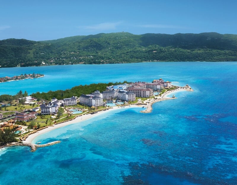Aerial view of All-inclusive Secrets St. James and Secrets Wild Orchid resorts in Jamaica 
