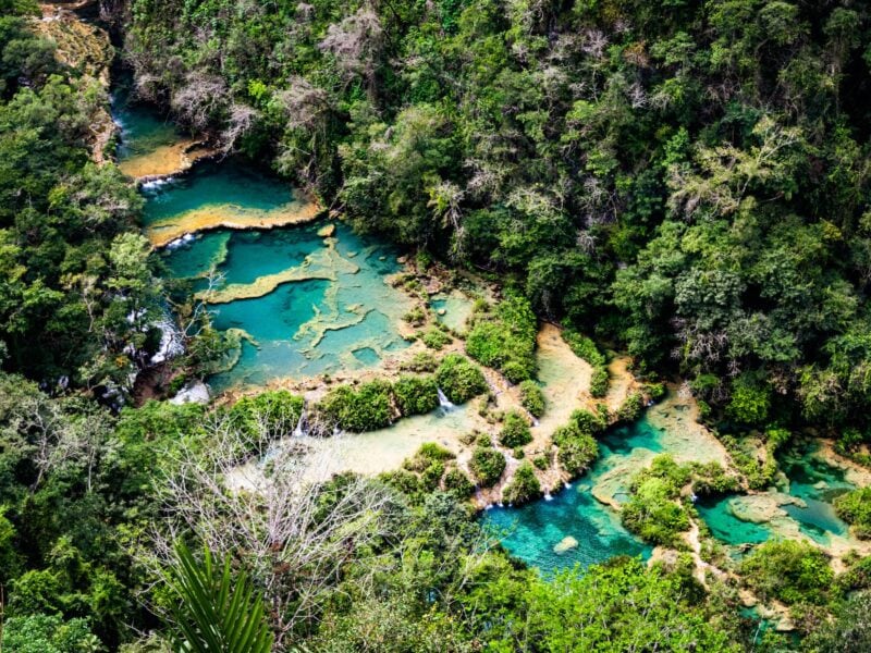 The terraced limestone pools of Semuc Champey are one of the best places to go in Guatemala.
