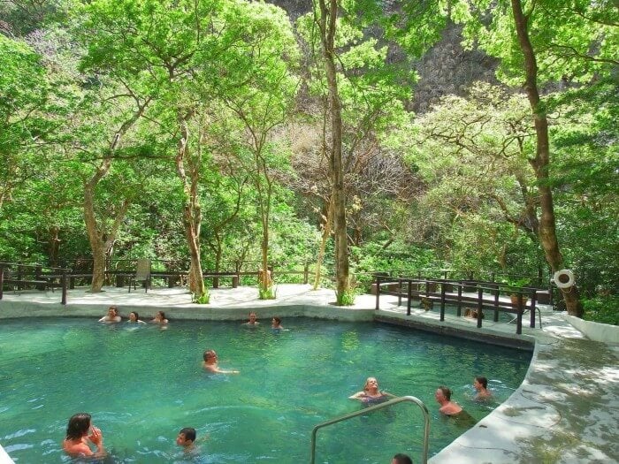 Soaking in a volcanic thermal pool in Rincon de la Vieja Park Costa Rica