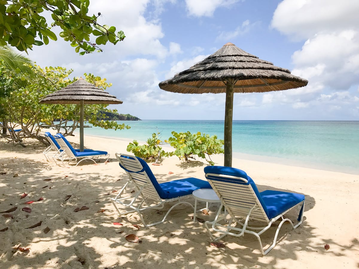 Two beach loungers at Spice Island Beach Resort Grenada
