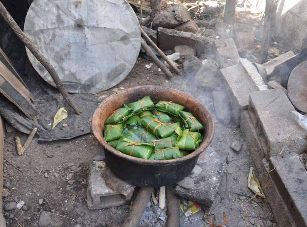 Cooking tamales in a pot in Guatemala