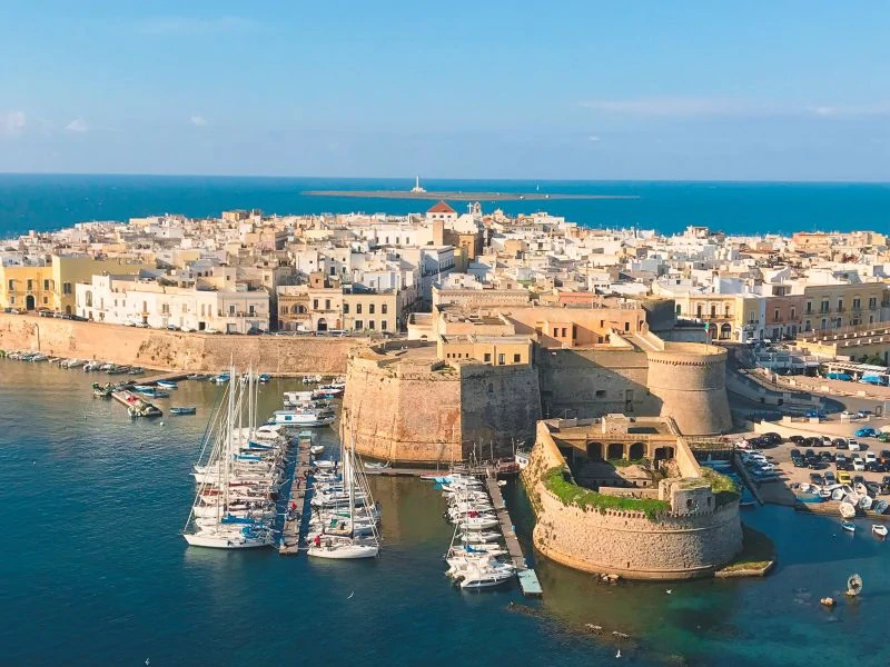 A view of the walls of Castello di Gallipoli, marina and harbour.