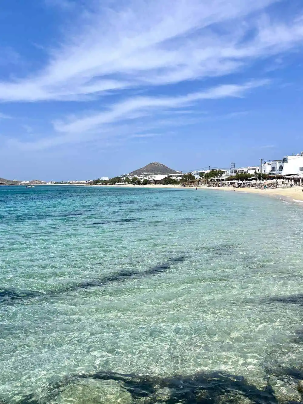 View of water and restaurants at Agia Anna Beach in Naxos. 