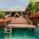 Aruba Ocean Villas with stairs leading to water.