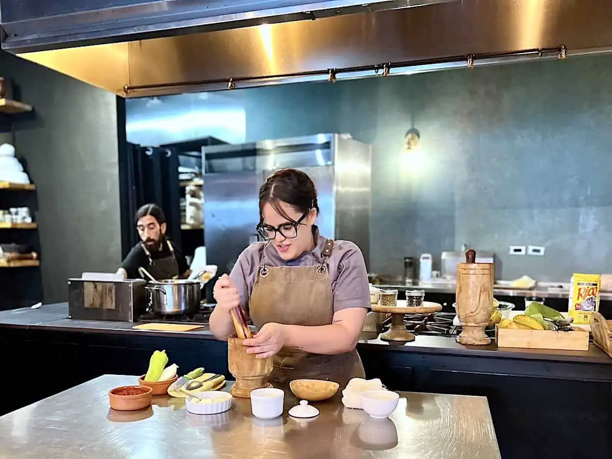  Chef Stephanie Haddock cooking at Atelier at Cocina Abierta. 