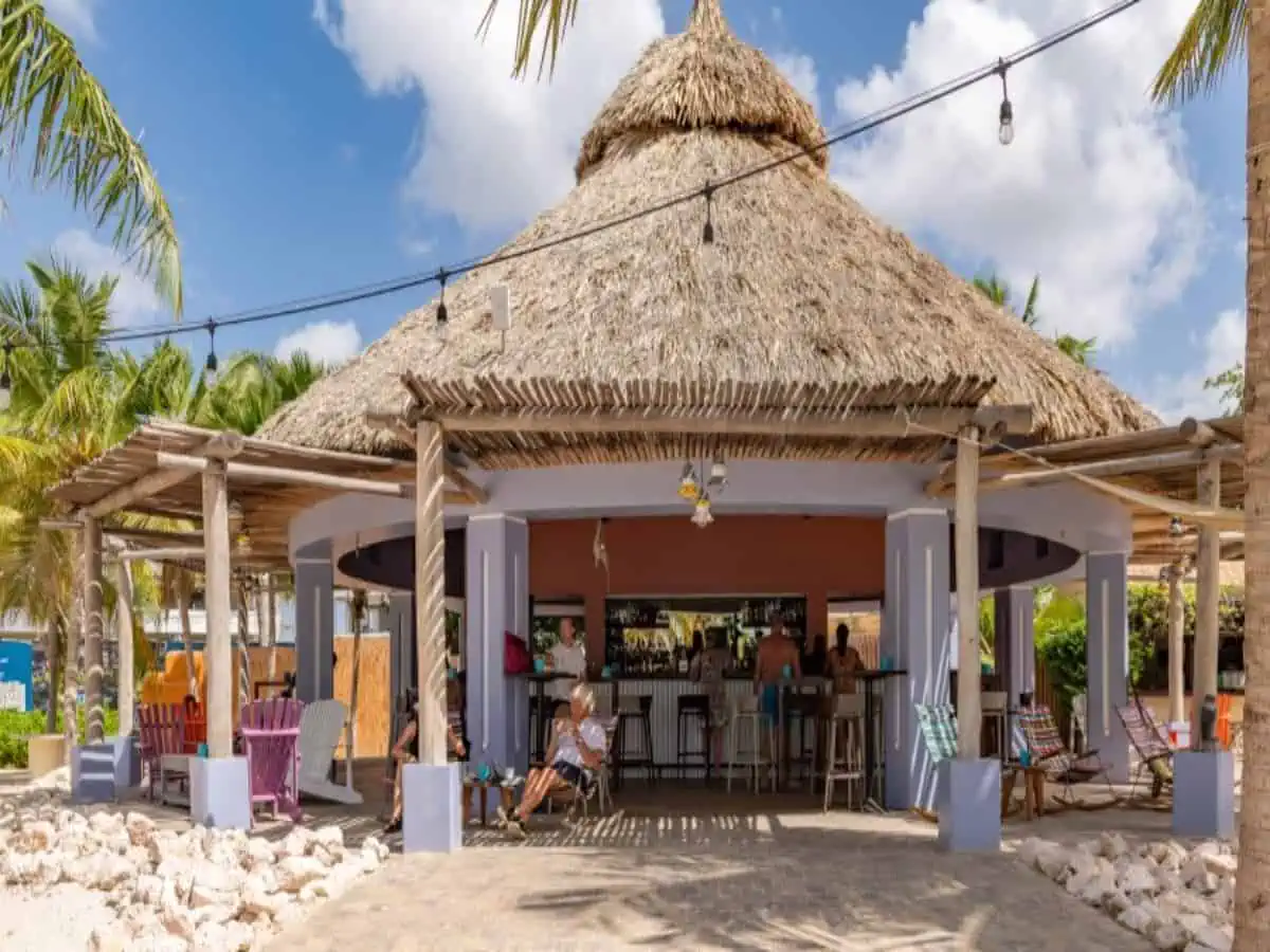 Tiki Bar with guests sitting.