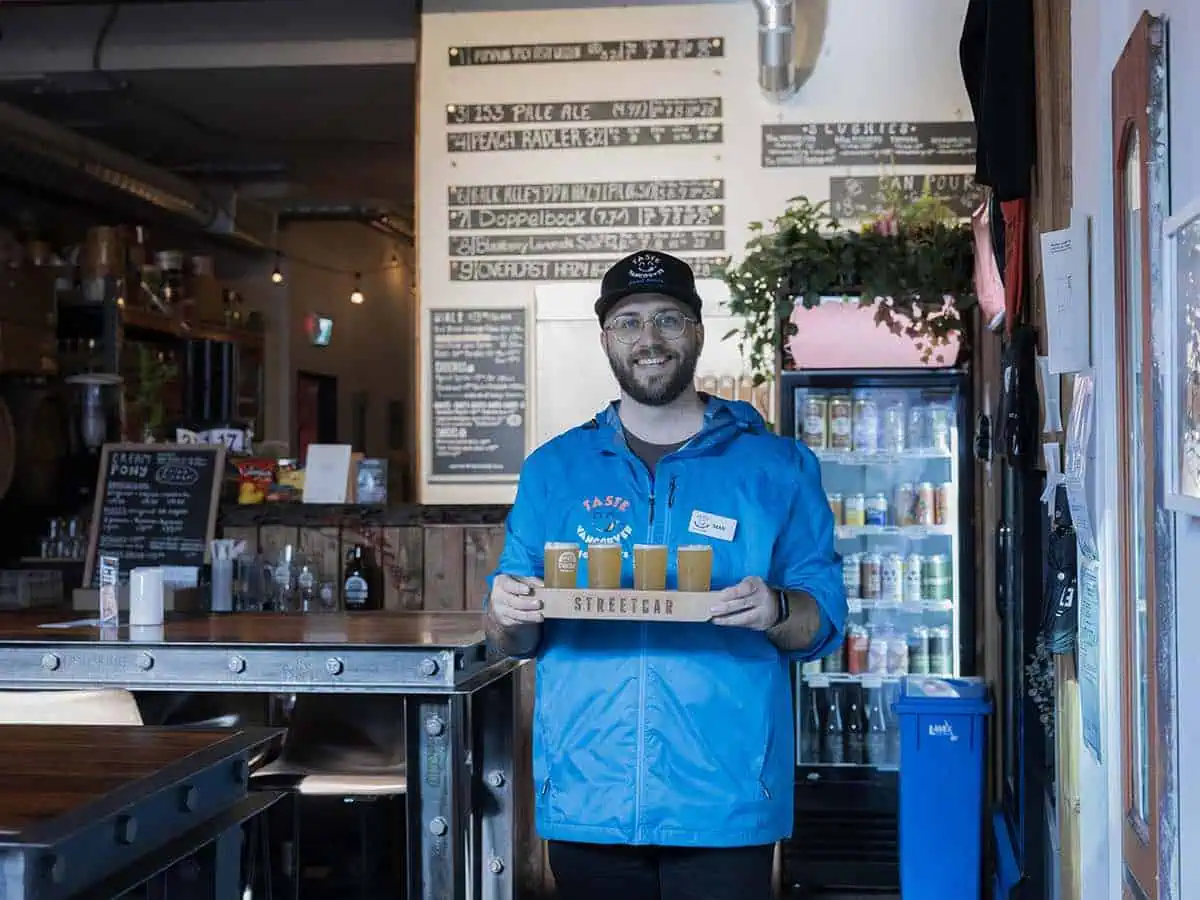 Sean, a food tour guide with a tasting at Streetcar Brewing..  