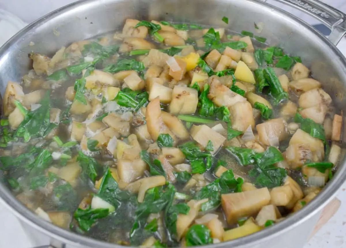 Chop up cooking in a stainless steel pot.