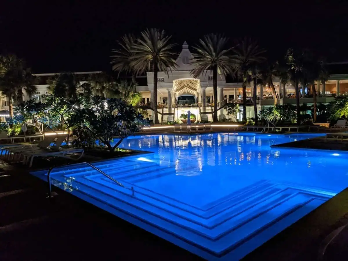 Curaçao Marriott Beach Resort's pool in the dark with blue lights. 