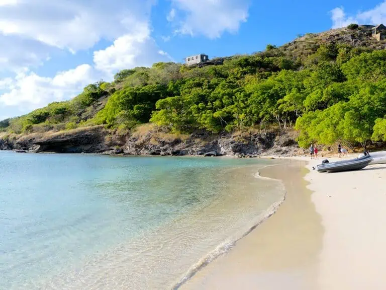 View of Deep Bay Beach in Antigua on a sunny day.