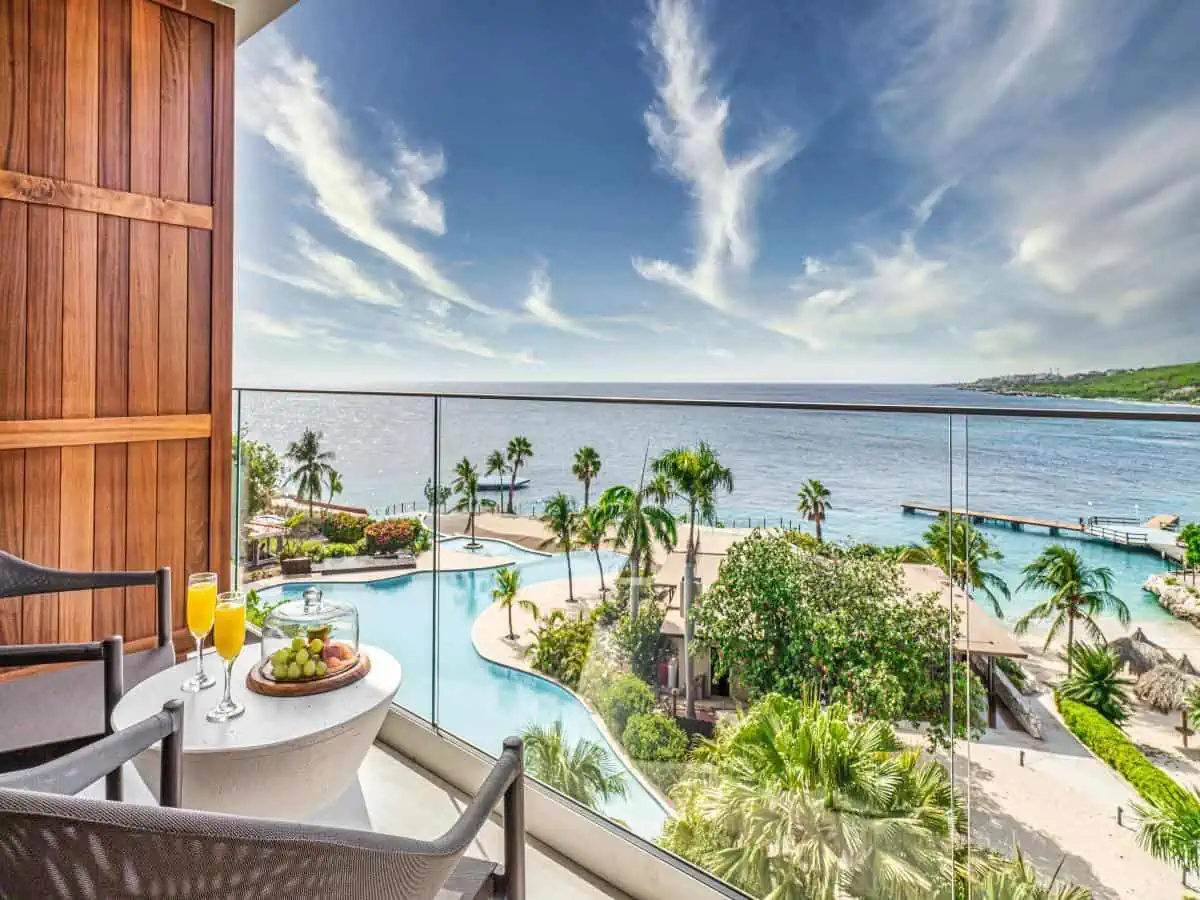 Dreams Curaçao Resort, Spa Casino view of pool and ocean. 