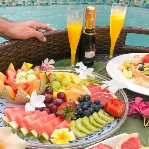 A brunch tray in a swimming pool at Boardwalk Boutique Hotel Aruba.