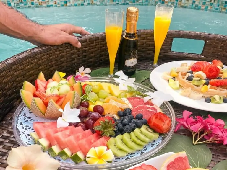 A brunch tray in a swimming pool at Boardwalk Boutique Hotel Aruba.