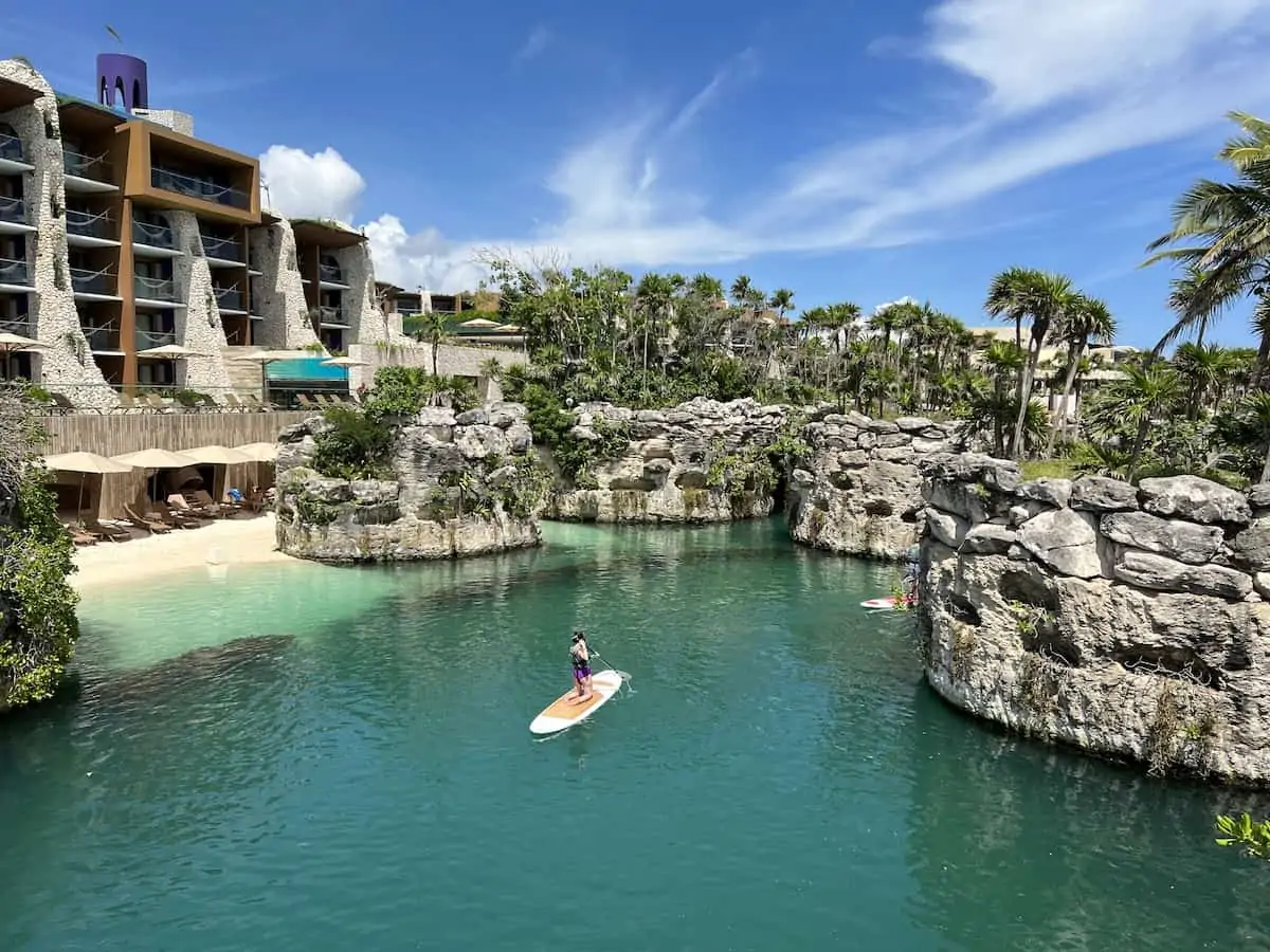 Person paddleboarding at Hotel Xcaret Arte in Mexico.