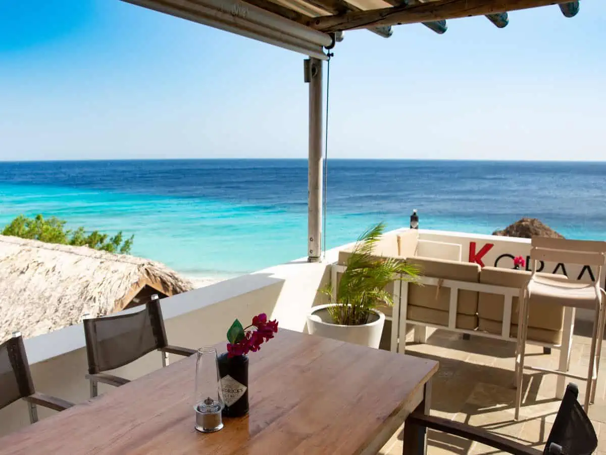 Restaurant tables overlooking ocean.