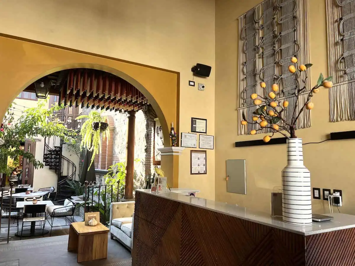 Reception desk in the lobby at Mestizo Hotel in Antigua.