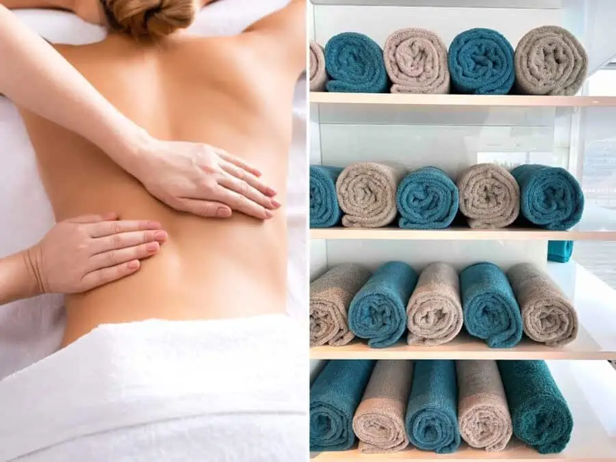 massage therapist with client and rolls of towels in a spa. 