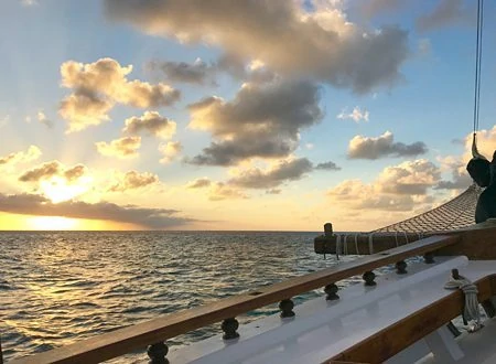 View of the Caribbean sea from the ship during a Montforte Dinner Cruise in Aruba .