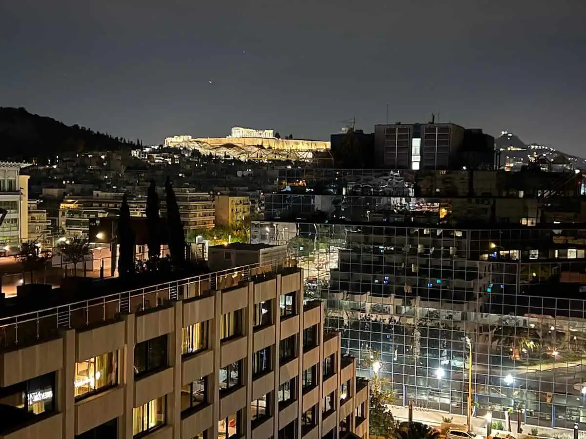 View of Acropolis illuminated at night. 