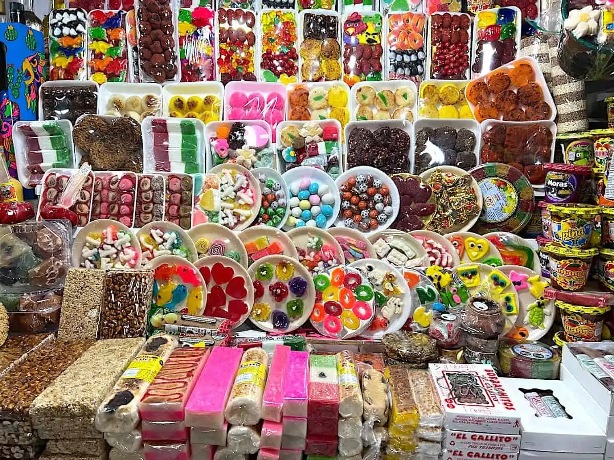 A selection of Mexican dulces in a food stall.