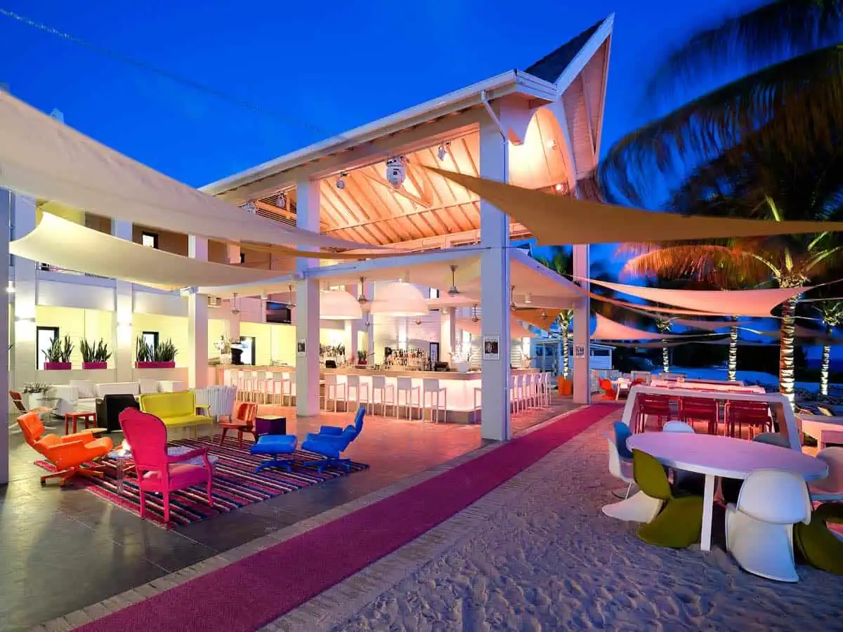 Indoor and outdoor beach bar in the evening.