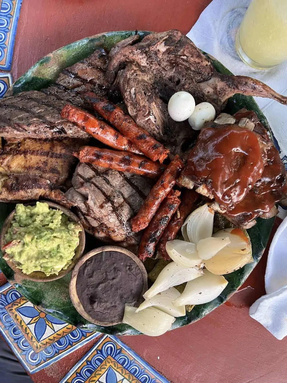 A platter of grilled meats at el rincon de los almendras restaurant in Puerto Escondido. 