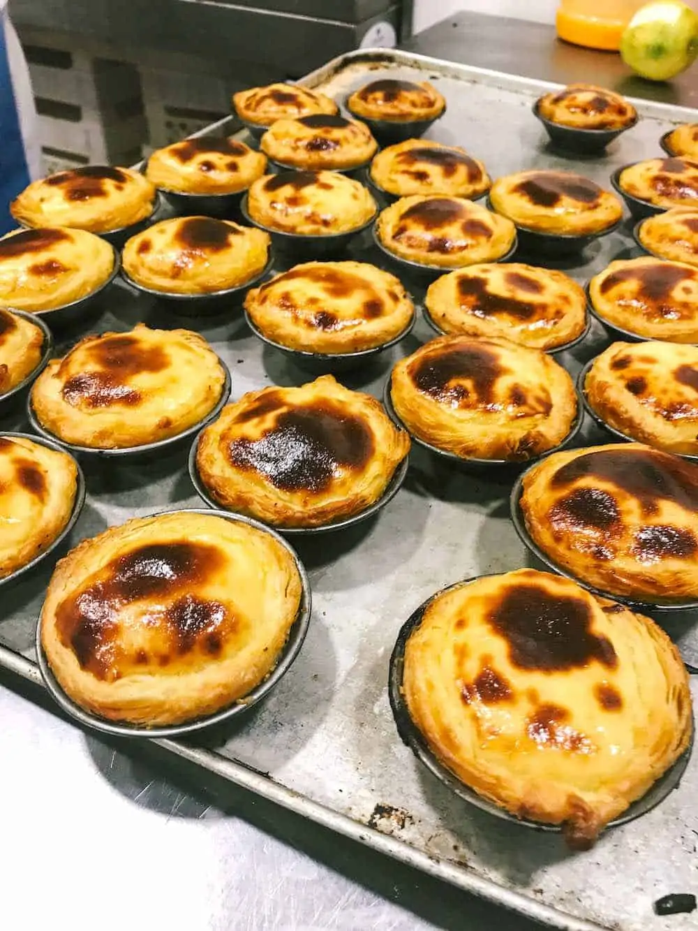 Pastéis de Nata pastry on a tray in Portugal..