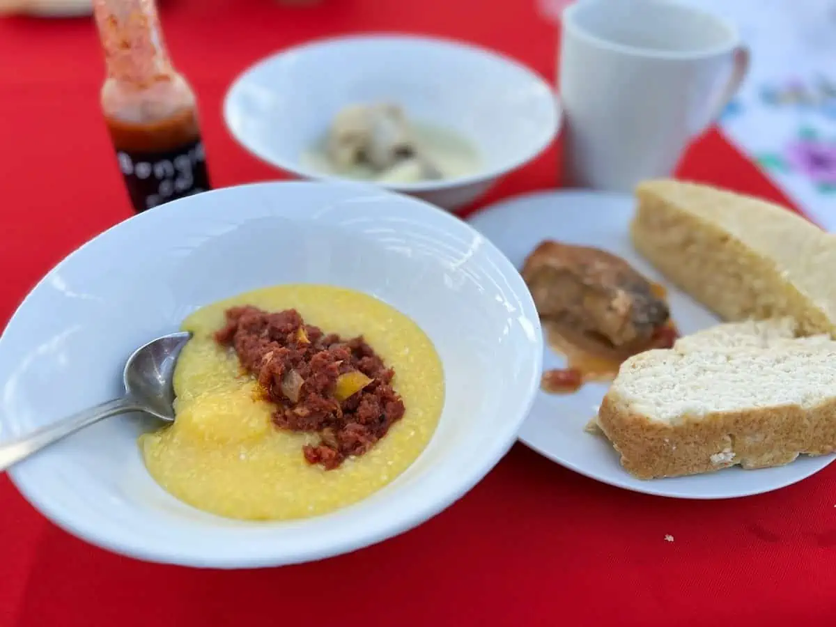 Breakfast on red table cloth.