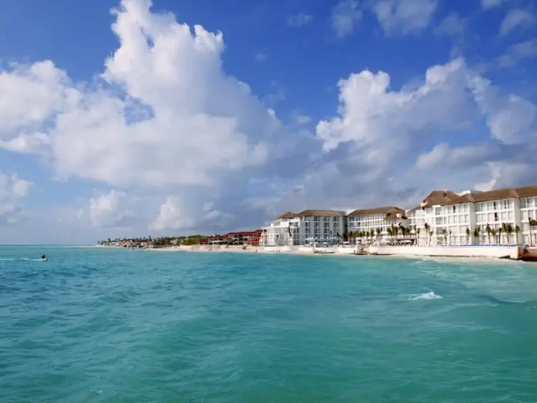 View of blue sky and Playa del Carmen Mexico from the water.