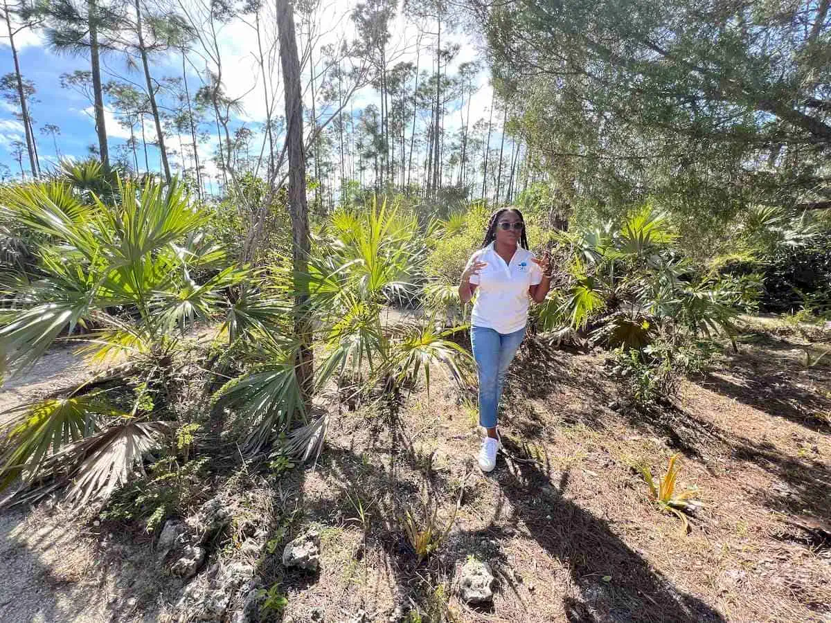 Education Officer talking with trees and plants. 