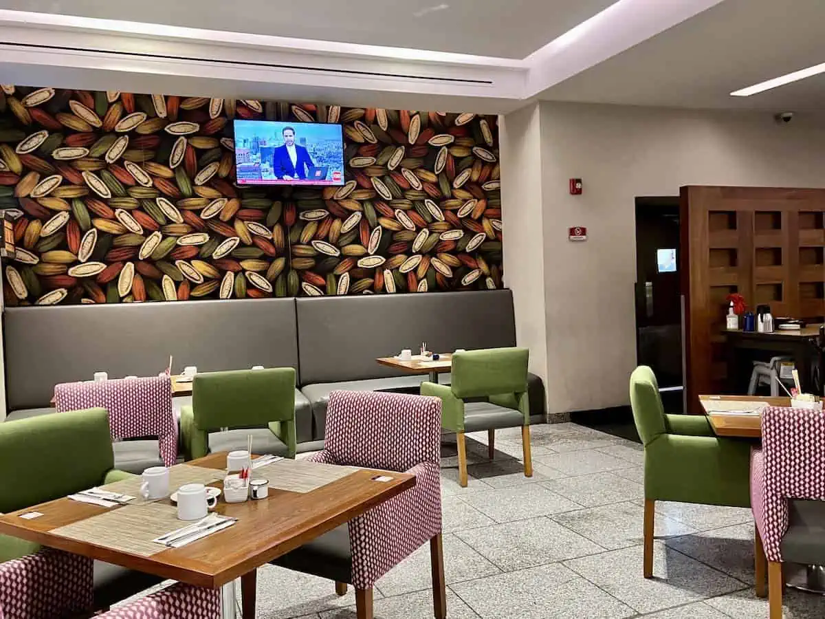 Restaurant tables and chairs at the Courtyard by Marriott Hotel in Mexico City Airport. 