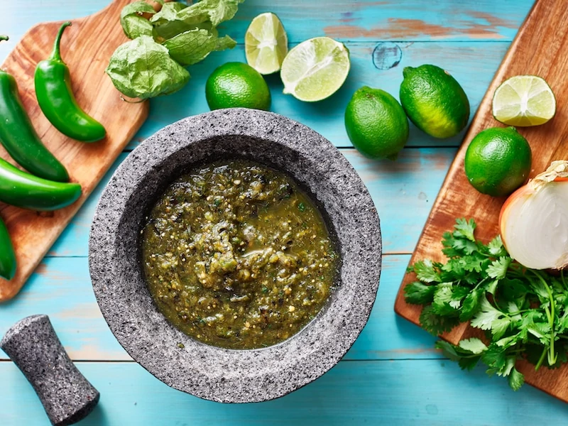 salsa verde in stone molcajete Credit Depositphotos