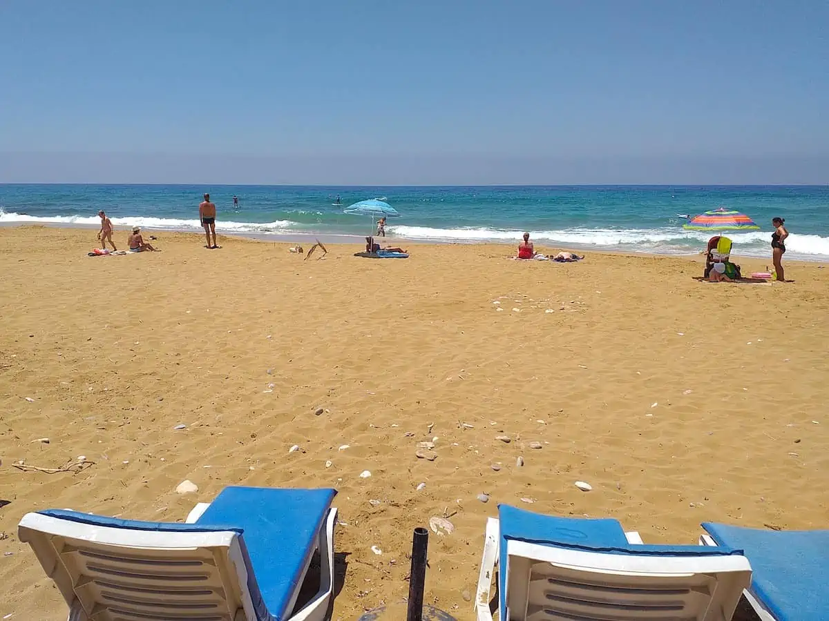 Beach chairs at Sandy Beach in Paphos Cyprus.