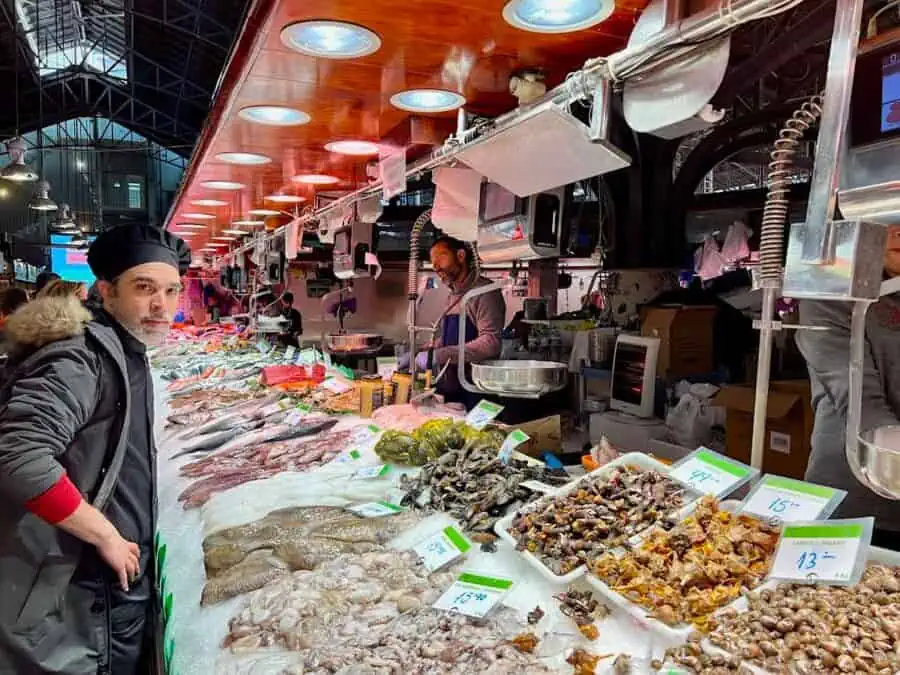 Chef Gabriel shopping for ingredients at La Boqueria Market in Barcelona. 