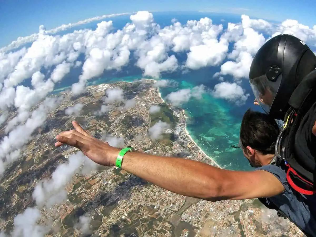 Two people skydiving in Aruba. 