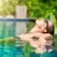 Woman outdoors in a pool in a spa in Cyprus.