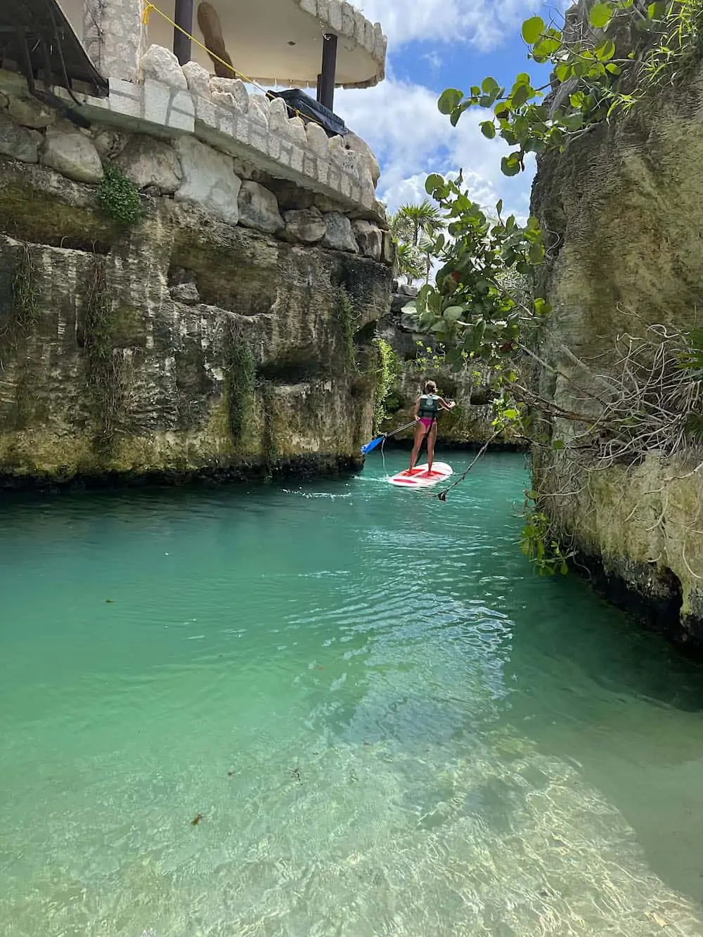 Woman doing SUP at Hotel Xcaret Arte.