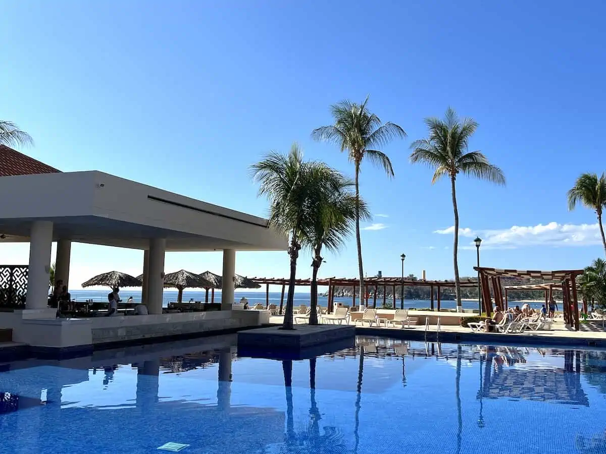 View of the swimming pool and swim-up bar at the Barcelo Huatulco resort in Mexico..